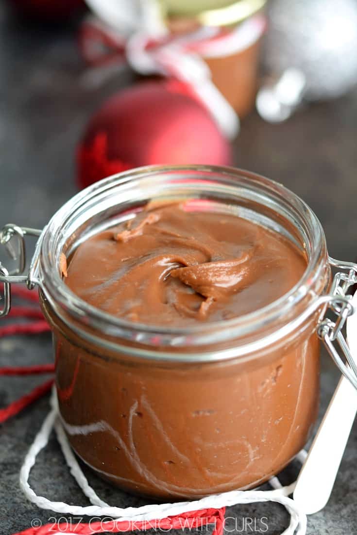 A glass jar filled with homemade spoon fudge.