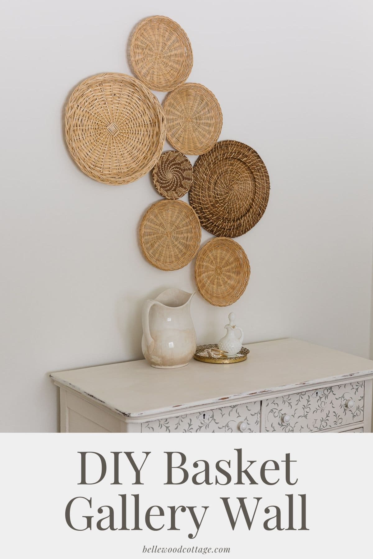 Vintage baskets arranged above a dresser with the words, "DIY Basket Gallery Wall".
