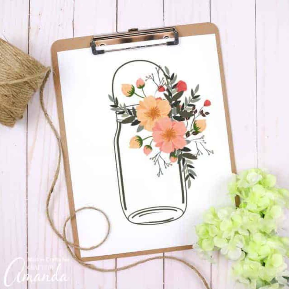 A mason jar printable clipped to a clipboard.