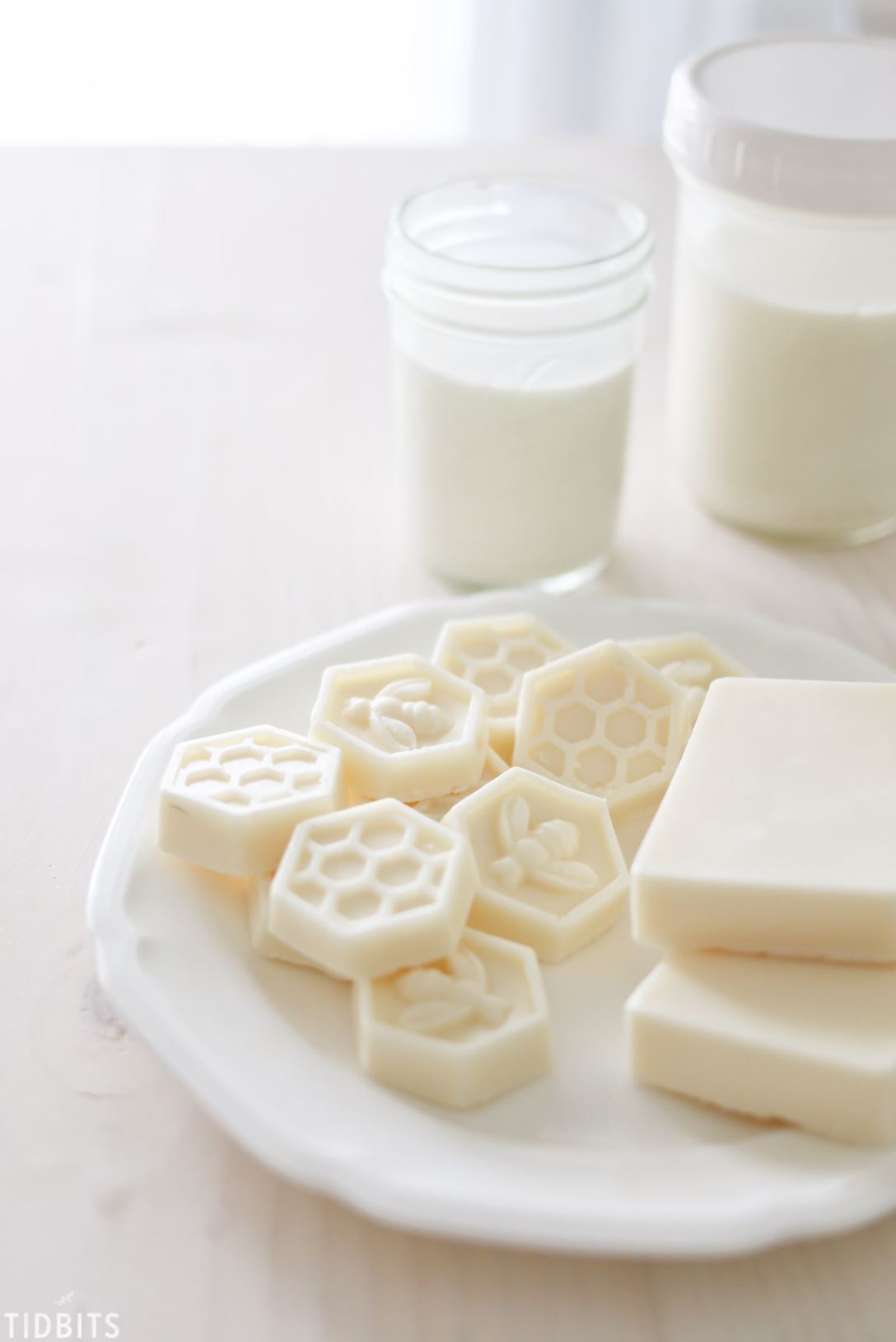 Small cream-colored honeycomb shaped soaps made from goat's milk and honey.