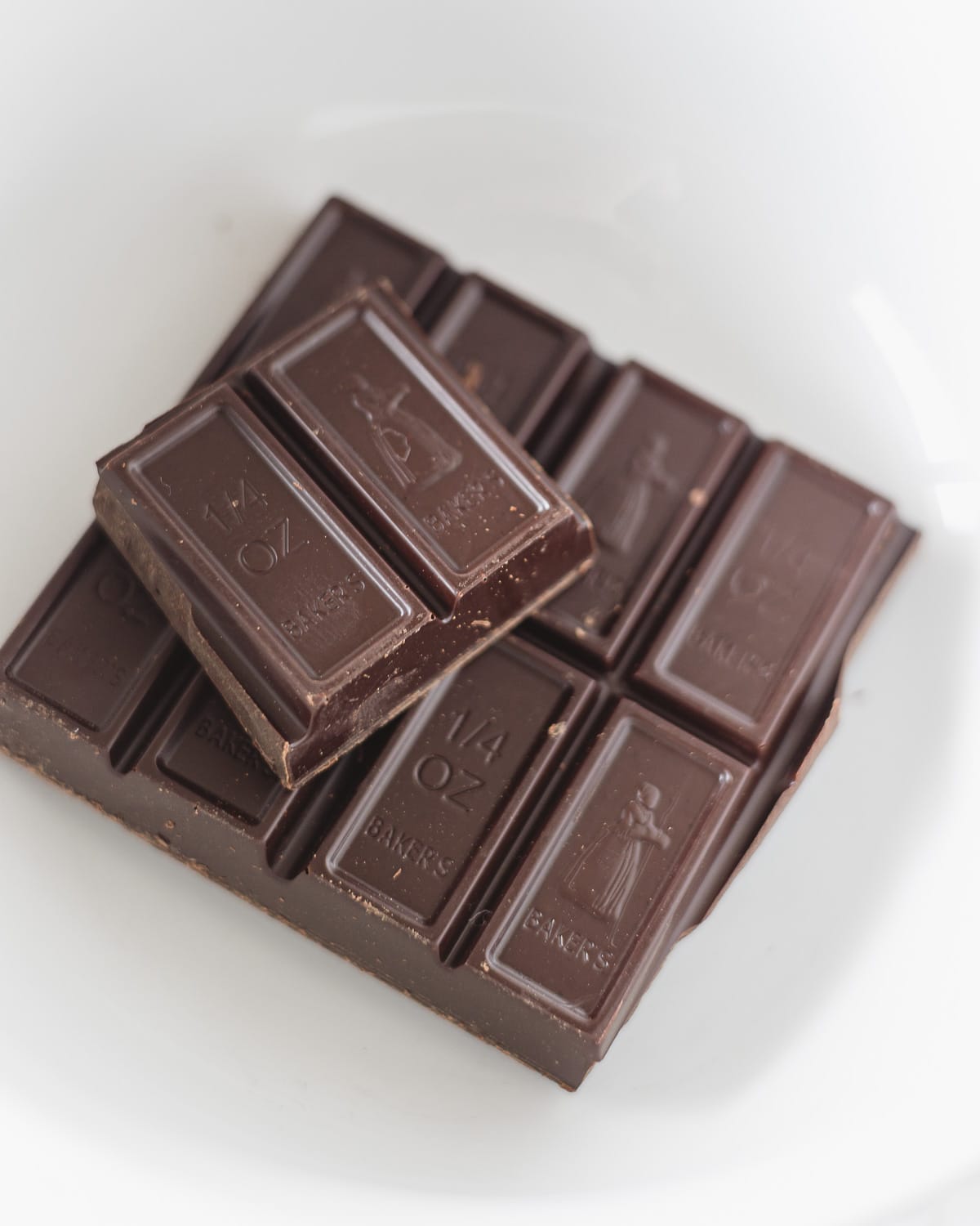 Squares of an unsweetened chocolate baking bar.