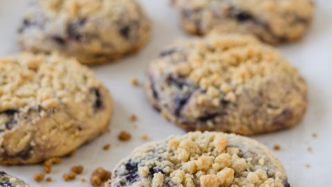 Blueberry Muffin Cookies on a parchment-lined sheet pan.