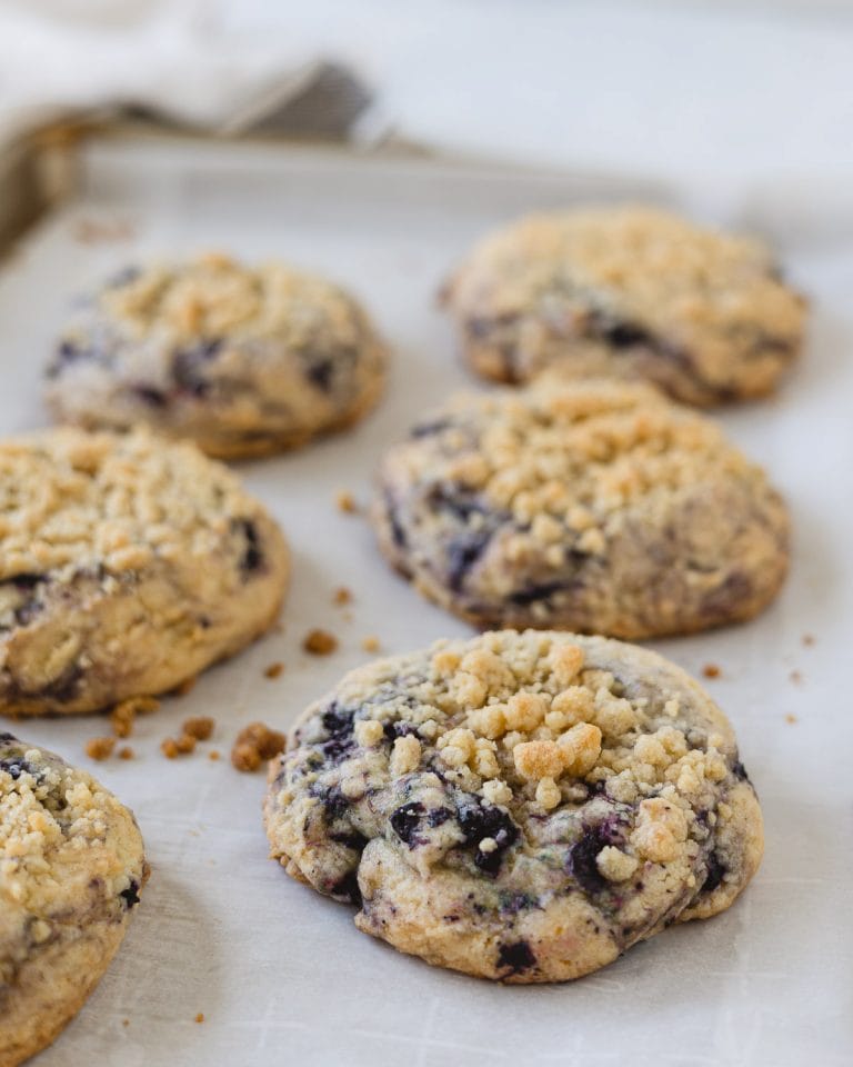 Blueberry Muffin Cookies on a parchment-lined sheet pan.