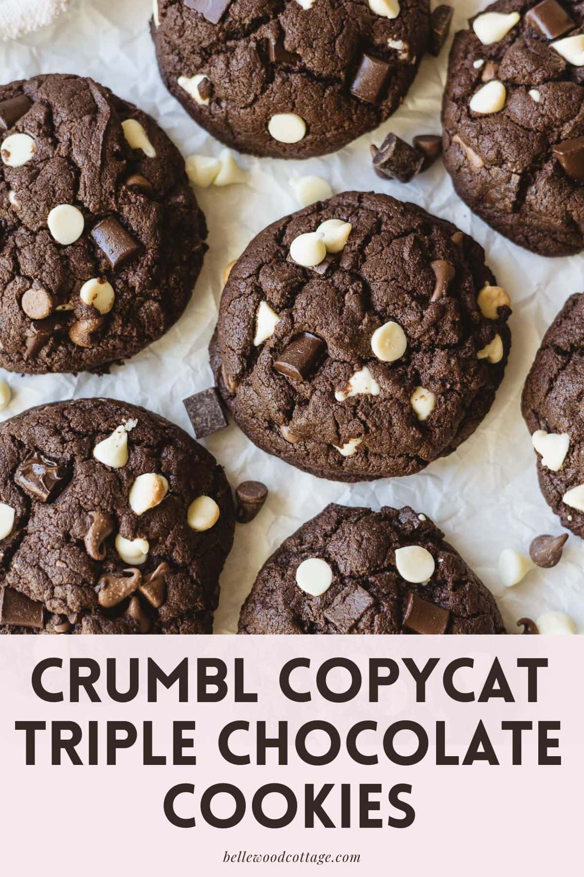 Chocolate cookies arranged on parchment with the words, "Crumbl Copycat Triple Chocolate Cookies"