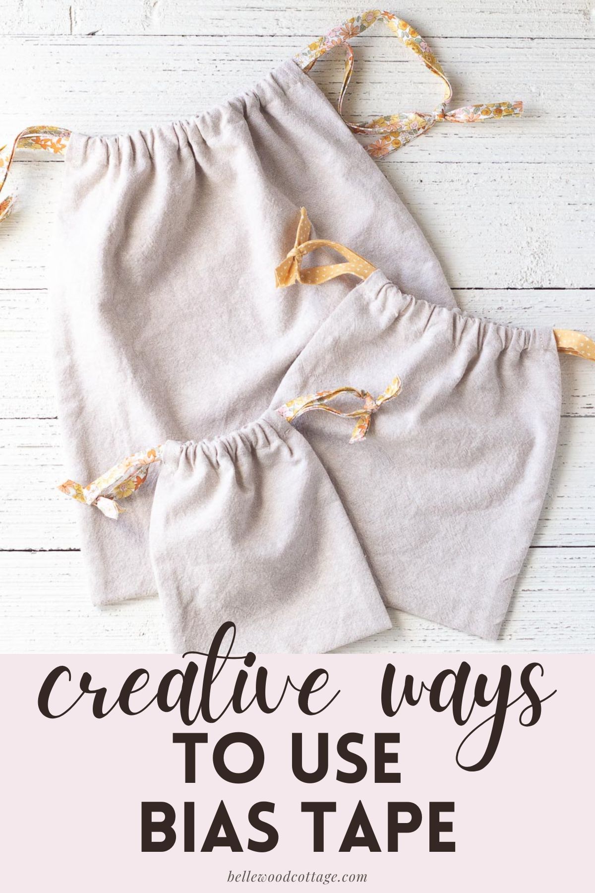 Three linen drawstring bags with bias tape drawstrings with the words, "Creative Ways to Use Bias Tape"