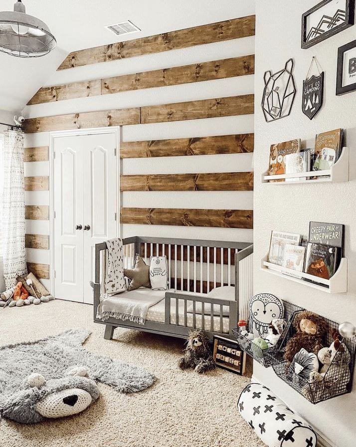 A toddler boy's room with rustic "striped" shiplap, camping, and bear décor.