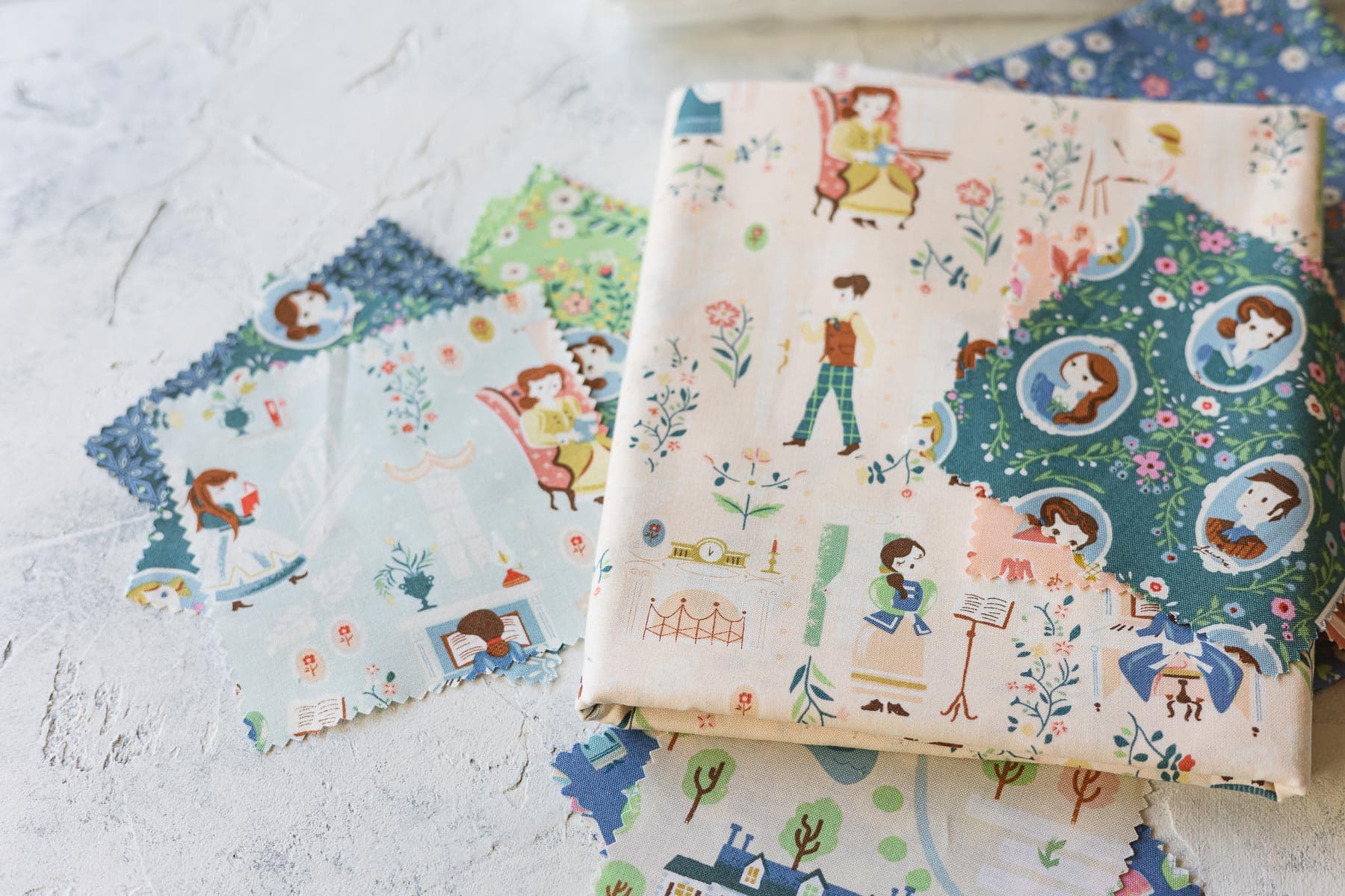 Charm squares and fabric from Riley Blake's Little Women fabric collection by Jill Howarth.