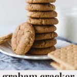 A stack of graham cracker cookies on a white plates with the words, "Graham Cracker Cookies."