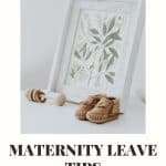 A wooden rattle, baby booties and neutral art with the words, "Maternity Leave Tips for Bloggers".