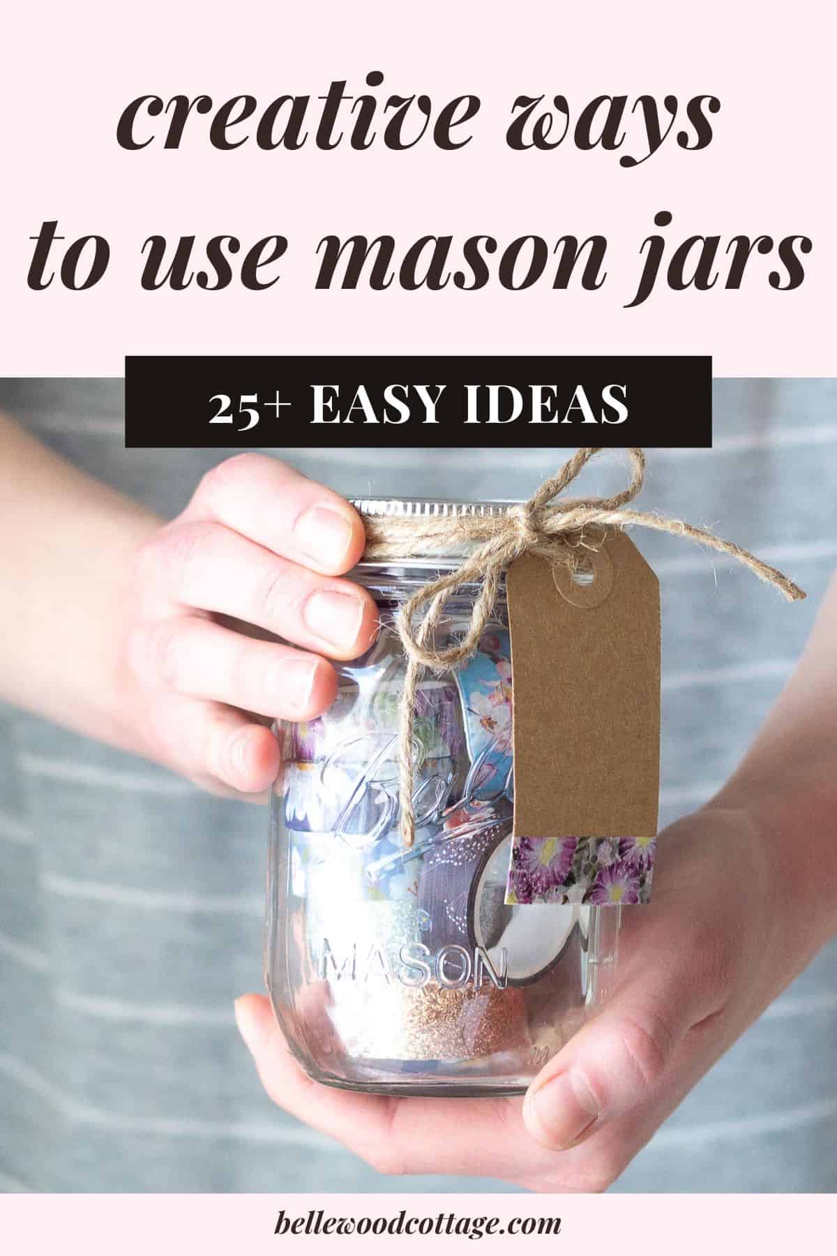 Woman holding a mason jar filled with washi tape, with the words, "Creative Ways to Use Mason Jars - 25 Easy Ideas".