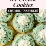 Sugar cookies frosted with green mint chocolate chip frosting and a piped rosette of whipped cream with the words, "Mint Chip Ice Cream Cookies - Crumbl Inspired".