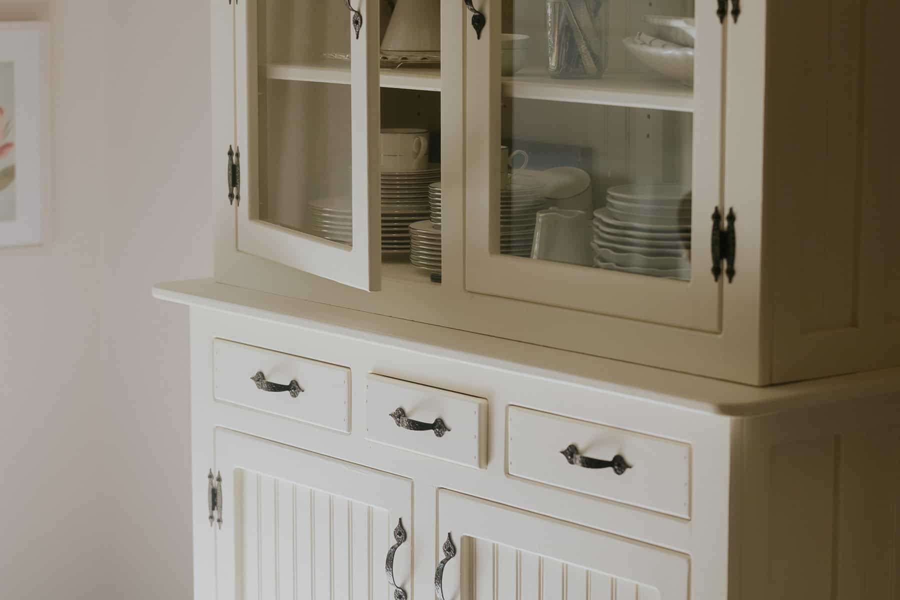 A white chalk painted hutch.