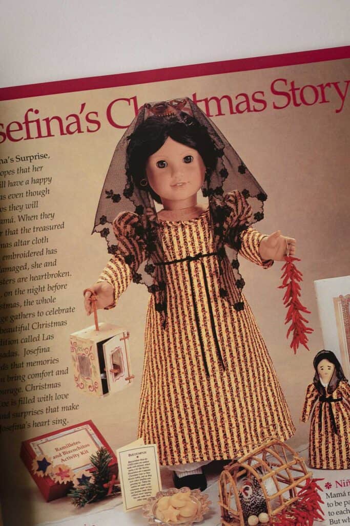 A page of a Pleasant Company catalog with Josefina in her yellow and black Christmas dress.